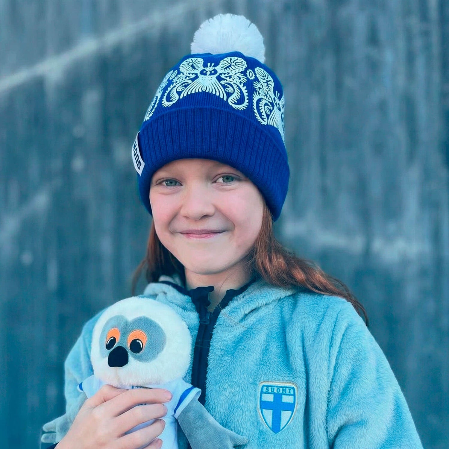 Finland owl tassel beanie by Klaus Haapaniemi, Blue
